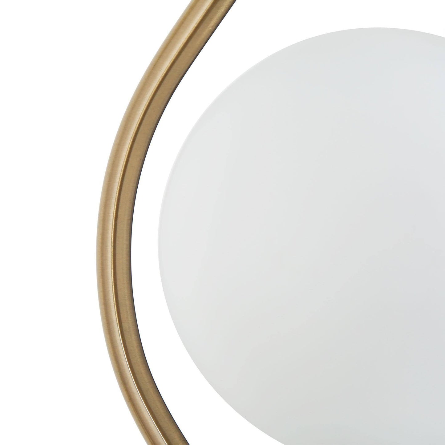 Close-up view of a modern pendant light's white glass globe with a surrounding gold & black frame detail.